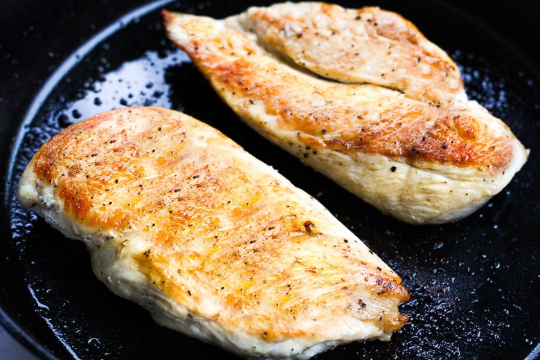 searing the chicken.