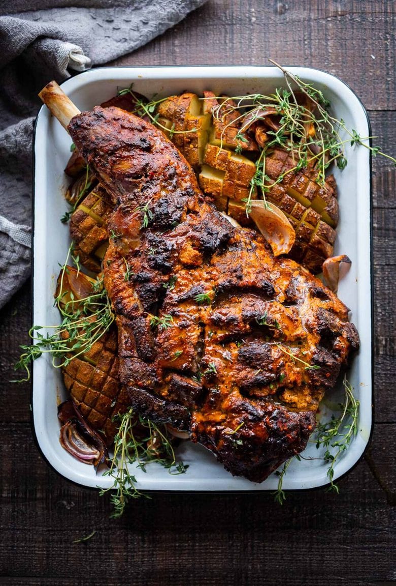 Harissa Roasted Leg of Lamb- a simple recipe for bone-in lamb roast with a flavorful crust.