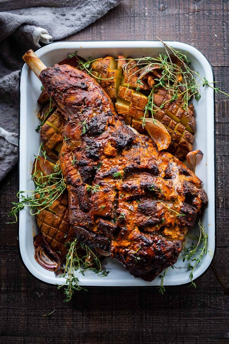 Harissa Roasted Leg of Lamb- a simple recipe for bone-in lamb roast with a flavorful crust. 