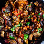 Delicious, Healthy Tagine Recipe with Eggplant and Chickpeas- seasoned with Moroccan spices and served over couscous. A simple plant-based dinner recipe! #tagine