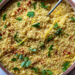 How to cook Couscous - a quick and easy recipe with three different flavor variations! Couscous is a North African (or Berber) sidedish of tiny steamed balls of crushed durum wheat that is traditionally served with flavorful tagines and stews. #couscous