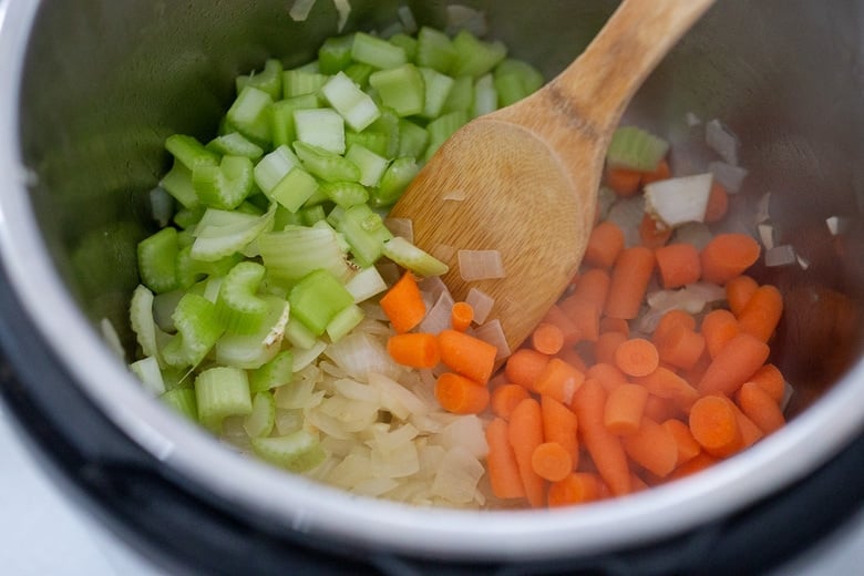 saute the onion, celery and carrot in the olive oil