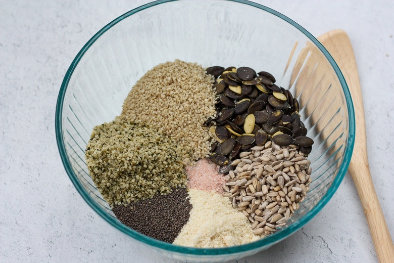 how to make the seed crackers- add everything to a bowl. 