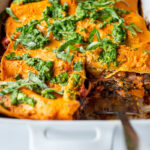 This Vegan Lasagna is made with a robust mushroom and spinach bolognese sauce, fresh basil, vegan ricotta and no-boil lasagna noodles, topped off with a creamy marinara sauce, drizzled with Arugula Pesto. Vegan comfort food at its tastiest!