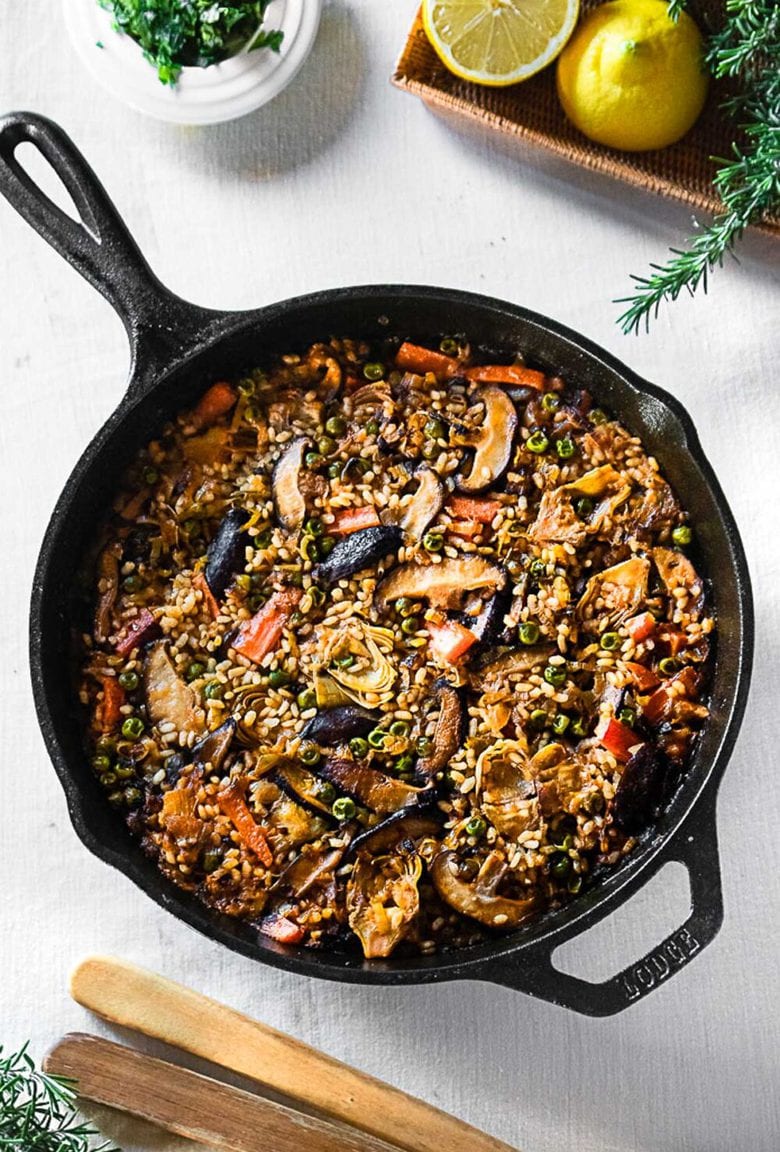 How to make authentic Vegetable Paella! As simple easy, and delicious dinner recipe that comes together in 35 minutes! #paella