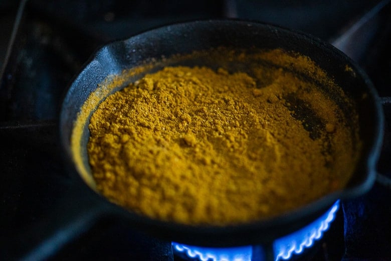 How to make homemade Yellow Curry Powder using spices you already have in your spice drawer. This mild Indian version is simple and easy and can be made with whole spices or ground spices. #currypowder #yellowcurrypowder #curry