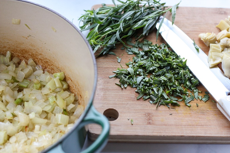 sautéing the onion, chopping herbs. 