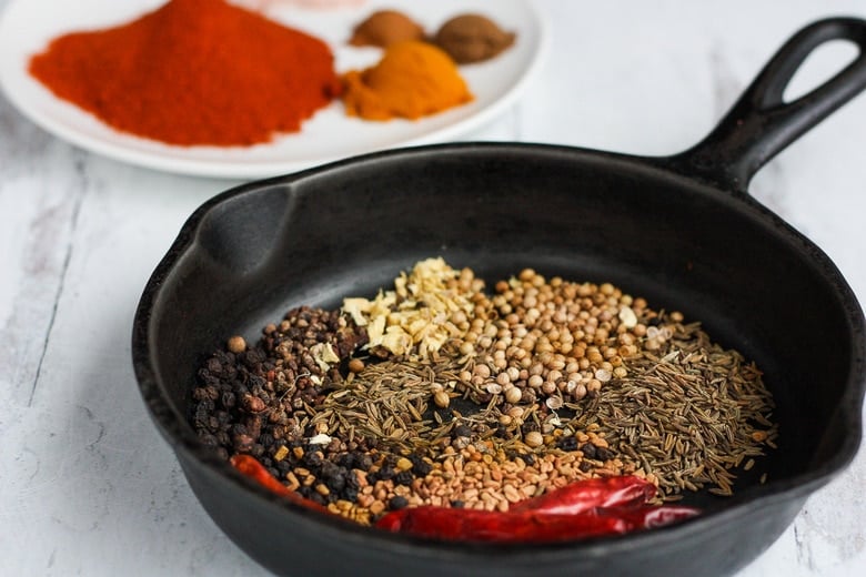 toasting the whole spices in the skillet