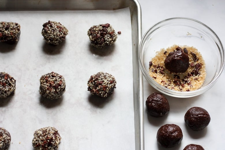shape into balls and coat with sesame seeds