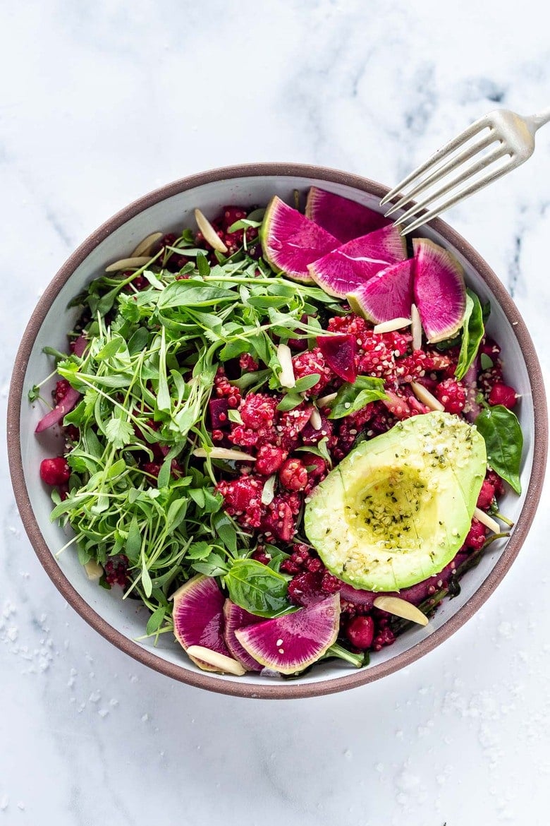 Brighten up your day with this Winter Bliss Bowl! A simple vegan bowl made with beets, quinoa, avocado and chickpeas-that can be made in under 30 minutes! Great for meal-prepping and guaranteed to lift your spirits! #bowl #buddhabowl #veganbowl #