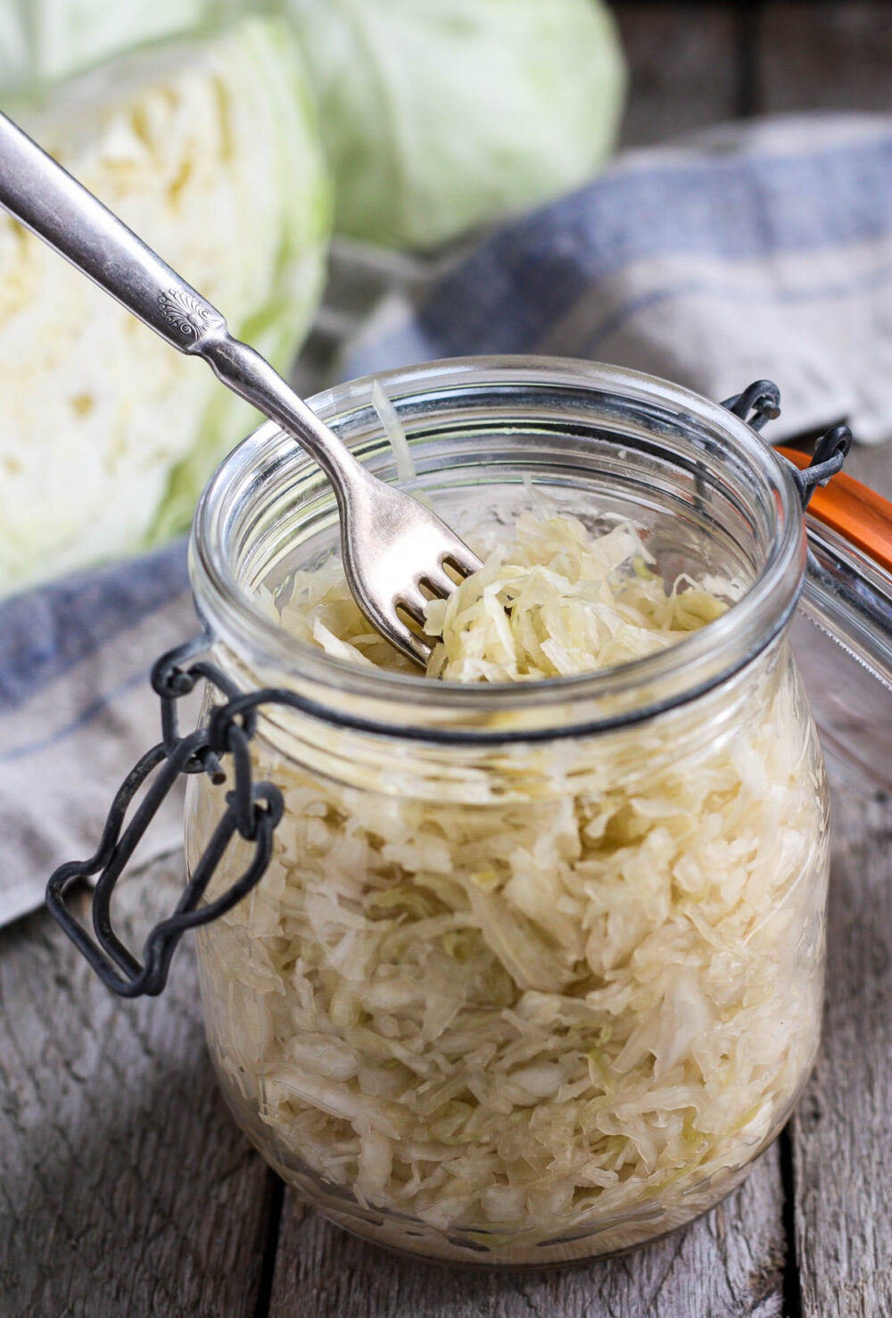 How to make Sauerkraut- a delicious tangy addition to many dishes.Brimming with gut-healing probiotics, cultured cabbage is easy to make at home with just two ingredients!  