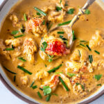 This Lobster Bisque Recipe is kept simple and easy with quick homemade lobster stock, big bites of lobster tail, and a creamy luscious bisque thickened with sweet potatoes. For Extra decadence the lobster is sautéed in browned butter. #lobsterbisque #lobster