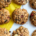 These healthy Breakfast Cookies can be made in under 30 minutes! They are chockfull of flavor and sustenance -filled with oats, seeds, spices and dried fruit they are vegan and deliciously addicting! Perfect for breakfast on the go. #breakfastcookie