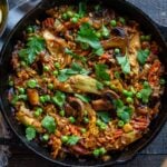 How to make authentic Vegetable Paella like they do in Spain! A simple, easy, vegetarian dinner recipe that comes together in under an hour! Vegetarian, vegan and gluten-free!
