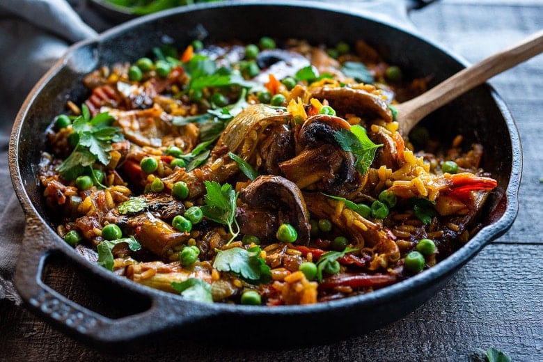 How to make authentic Vegetable Paella like they do in Spain! A simple, easy, vegetarian dinner recipe that comes together in under an hour! Vegetarian, vegan and gluten-free!