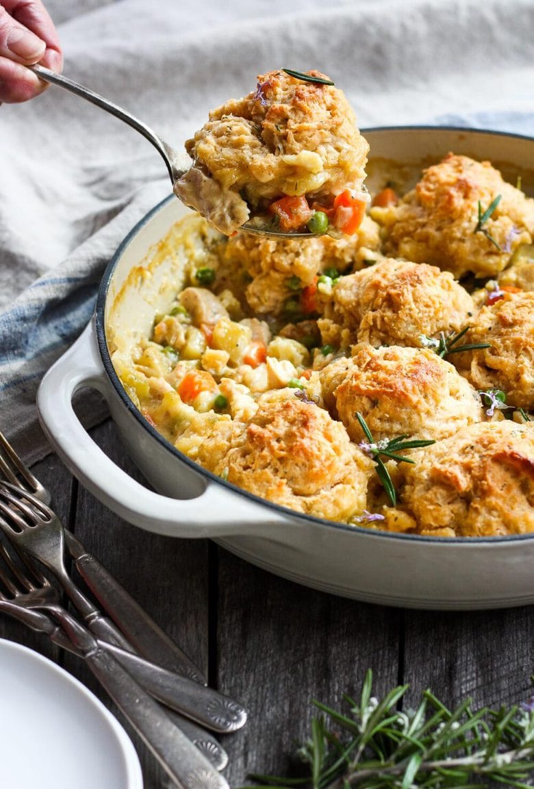 Classic Chicken Pot Pie with a quick and easy biscuit crust, tender veggies, fresh herbs, in a creamy wine sauce. #potpie