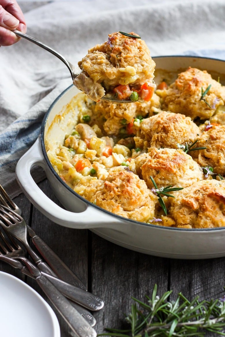 How to make Chicken Pot Pie with quick and easy biscuit crust, tender veggies, fresh herbs, in a creamy wine sauce. 