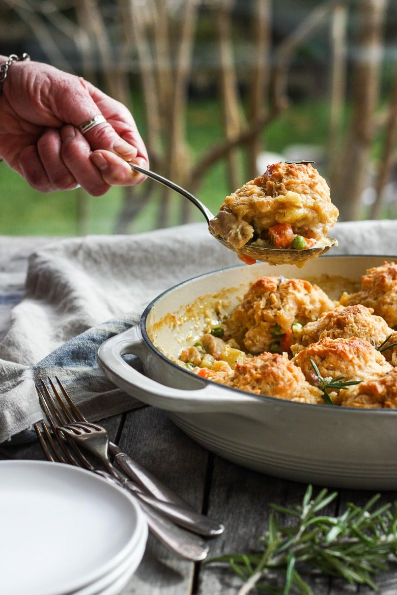 How to make Chicken Pot Pie with a quick and easy biscuit crust, tender veggies, fresh herbs, in a creamy wine sauce. #potpie 