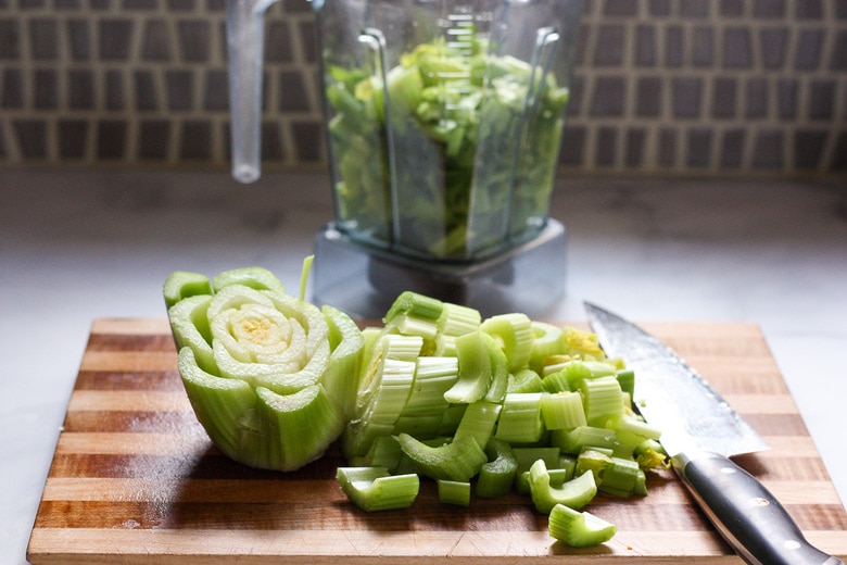 celery being chopped for the blender to make celery juice