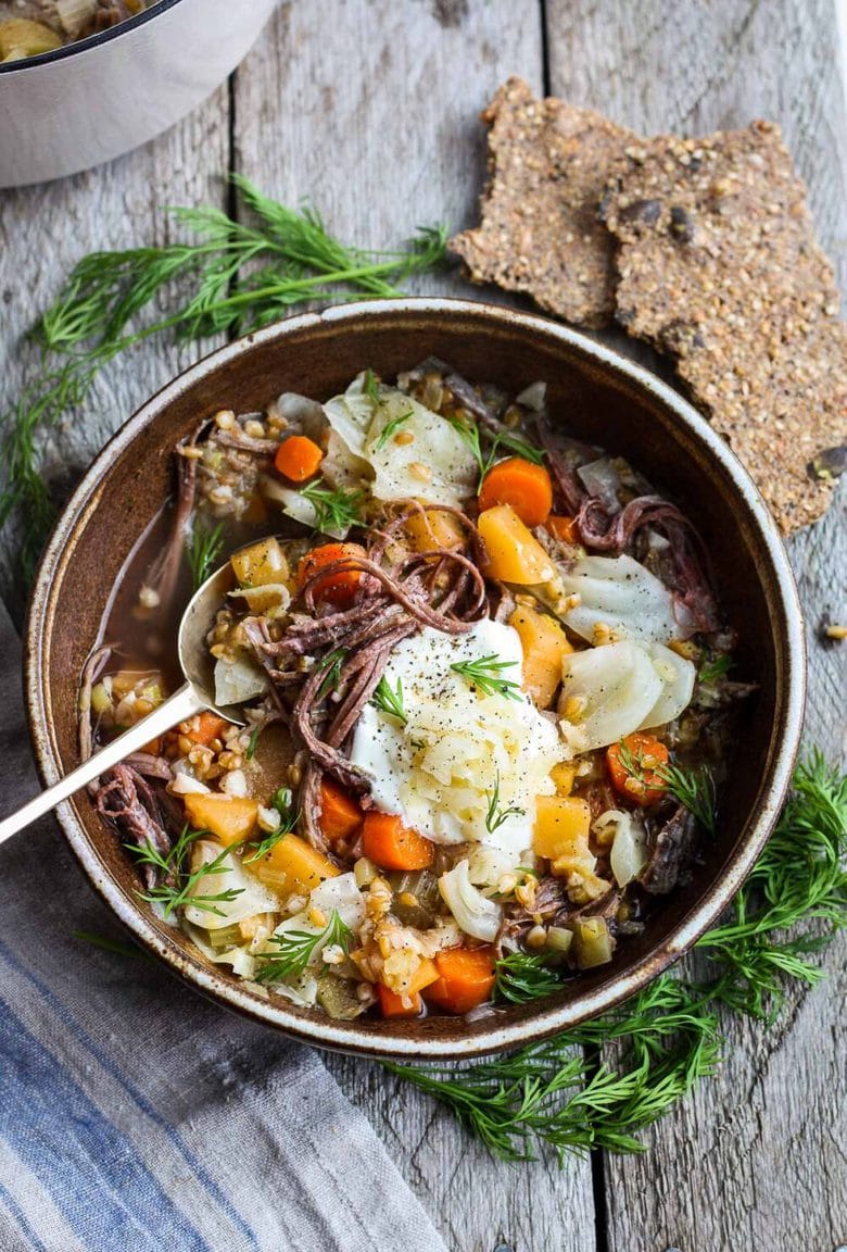 This Irish Stew is made with Corned Beef and Cabbage, farro and root veggies- simple, hearty and delicious, perfect for St. Patricks Day.