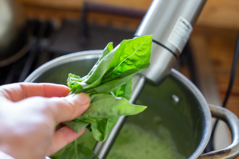 add basil and olive oil to the blended Aspargus and continue blending