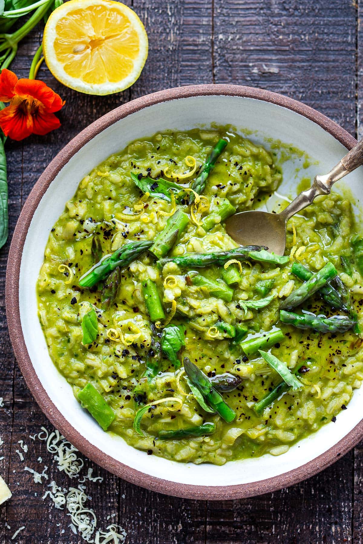Asparagus Risotto in a bowl with a spoon. 