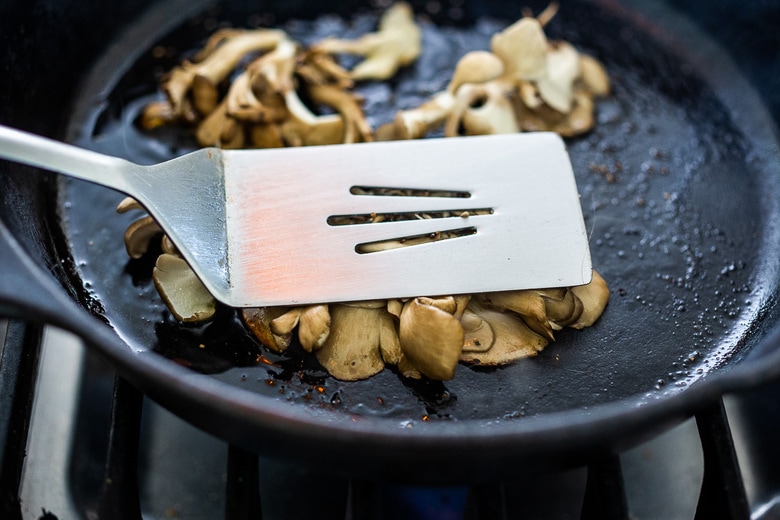 how to pan sear Maitake mushrooms - flatten with a spatula