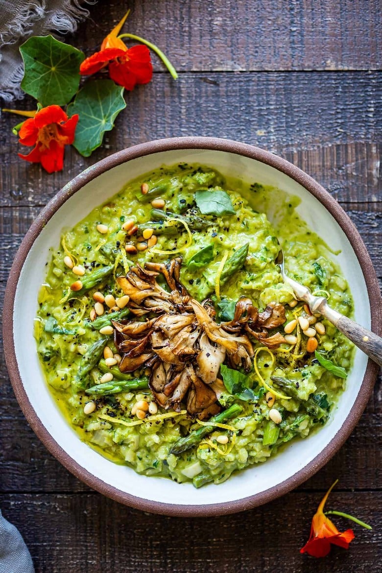 asparagus risotto served with basil, pine nuts, mushrooms, and lemon zest.