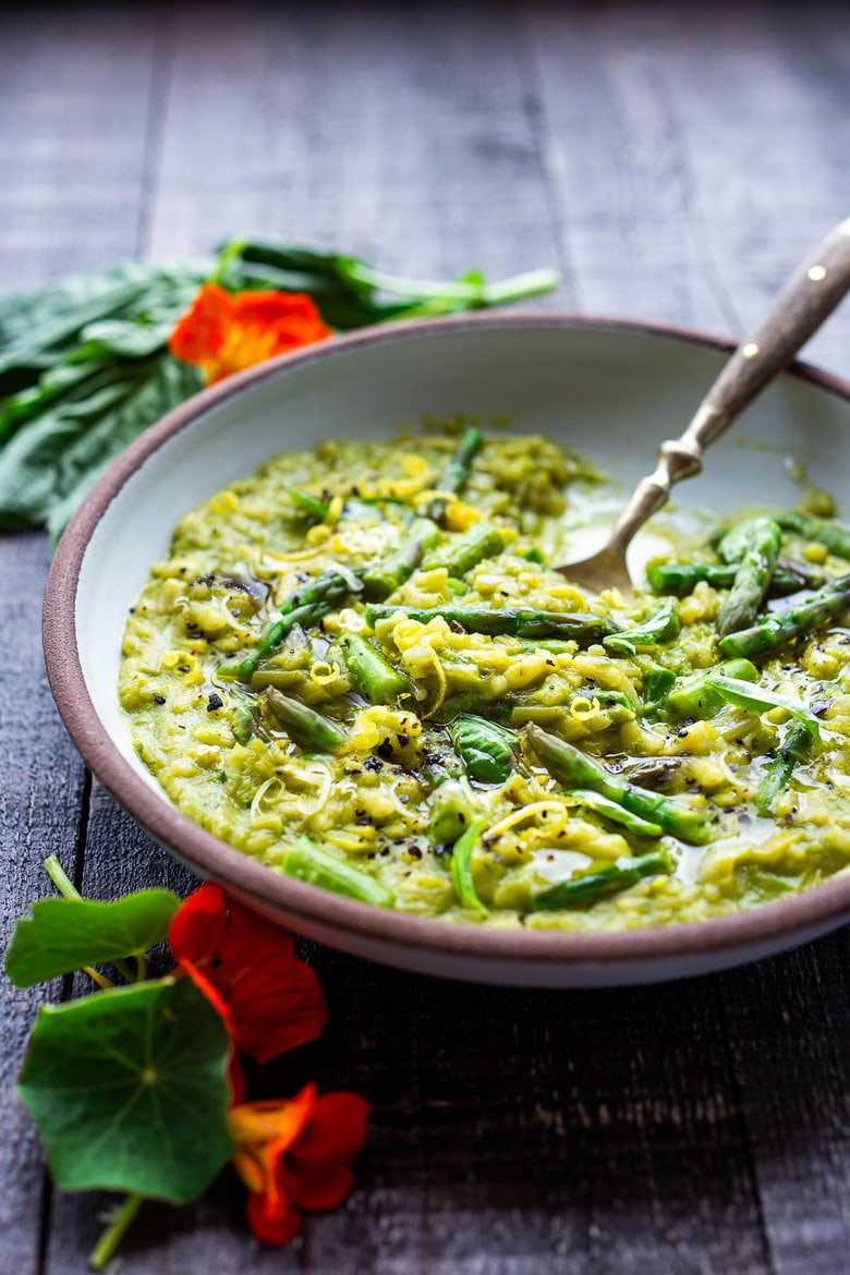 Lemony Asparagus Risotto with leeks and basil-light and creamy with vibrant color and flavor, perfect for spring! A tasty vegetarian meal, or beautiful base for fish, seafood or mushrooms!  #asparagus #risotto #springrecipes