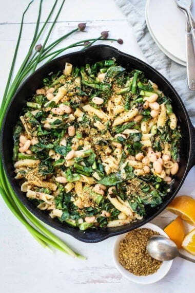 Asparagus Pasta with kale in a lemony Cannellini Bean Leek Sauce.  This healthy, vegan pasta recipe comes together in less than 30 minutes!