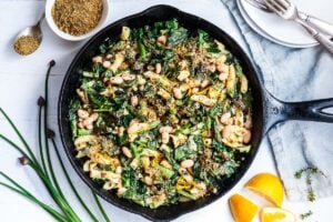  Asparagus Pasta with kale, leeks and a creamy Cannellini Bean Leek Sauce.  This healthy, spring, vegan pasta recipe comes together quickly and easily!