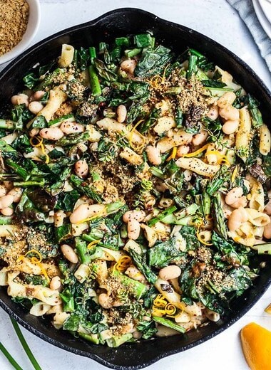  Asparagus Pasta with kale, leeks and a creamy Cannellini Bean Leek Sauce.  This healthy, spring, vegan pasta recipe comes together quickly and easily!