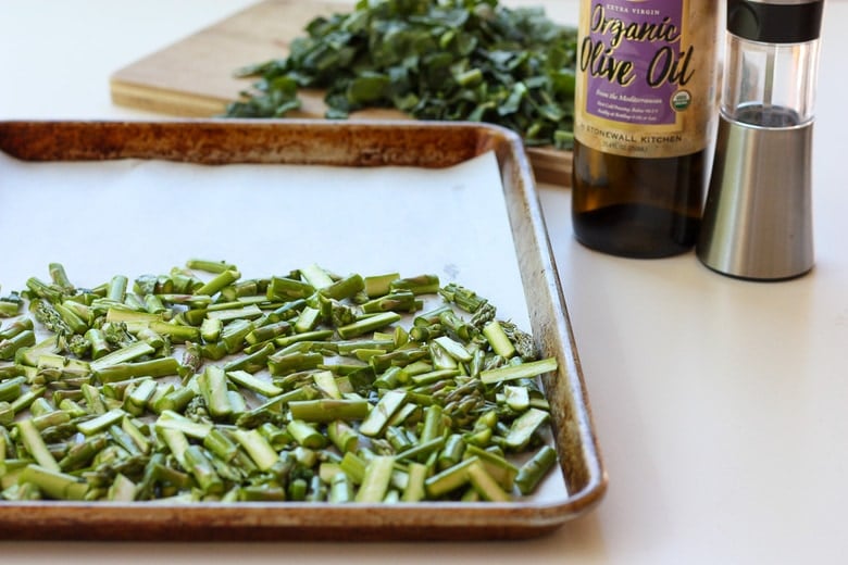 roasting the veggies on a sheet pan 