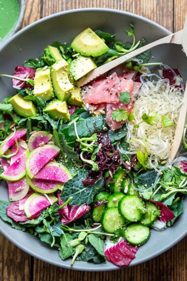 This unique seaweed salad recipe is the best! Made with dulse ribbons, kelp noodles, avocado, and greens, tossed in a spirulina dressing!