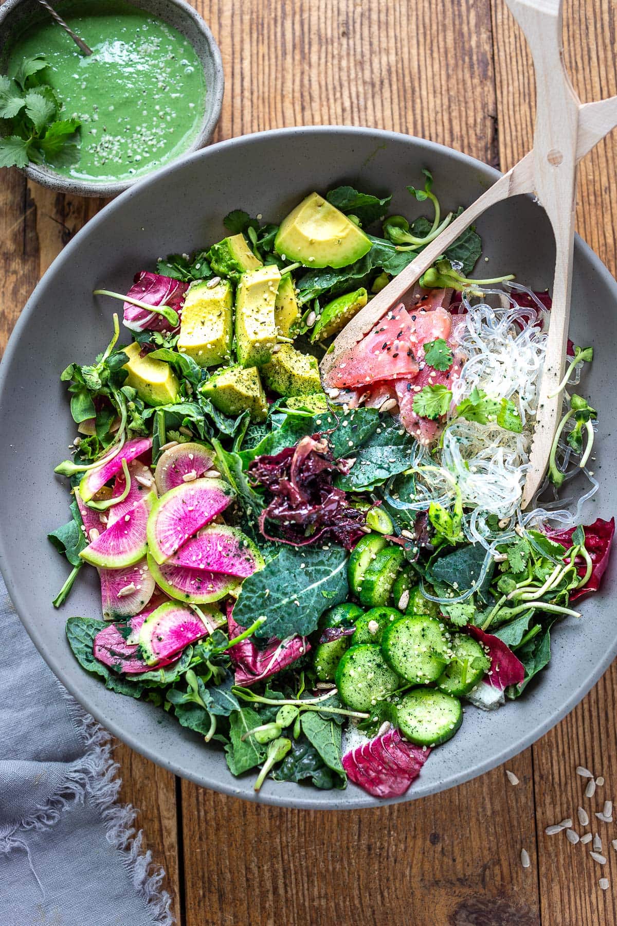 This unique seaweed salad recipe is the best! Made with dulse ribbons, kelp noodles, avocado, and greens, tossed in a spirulina dressing!