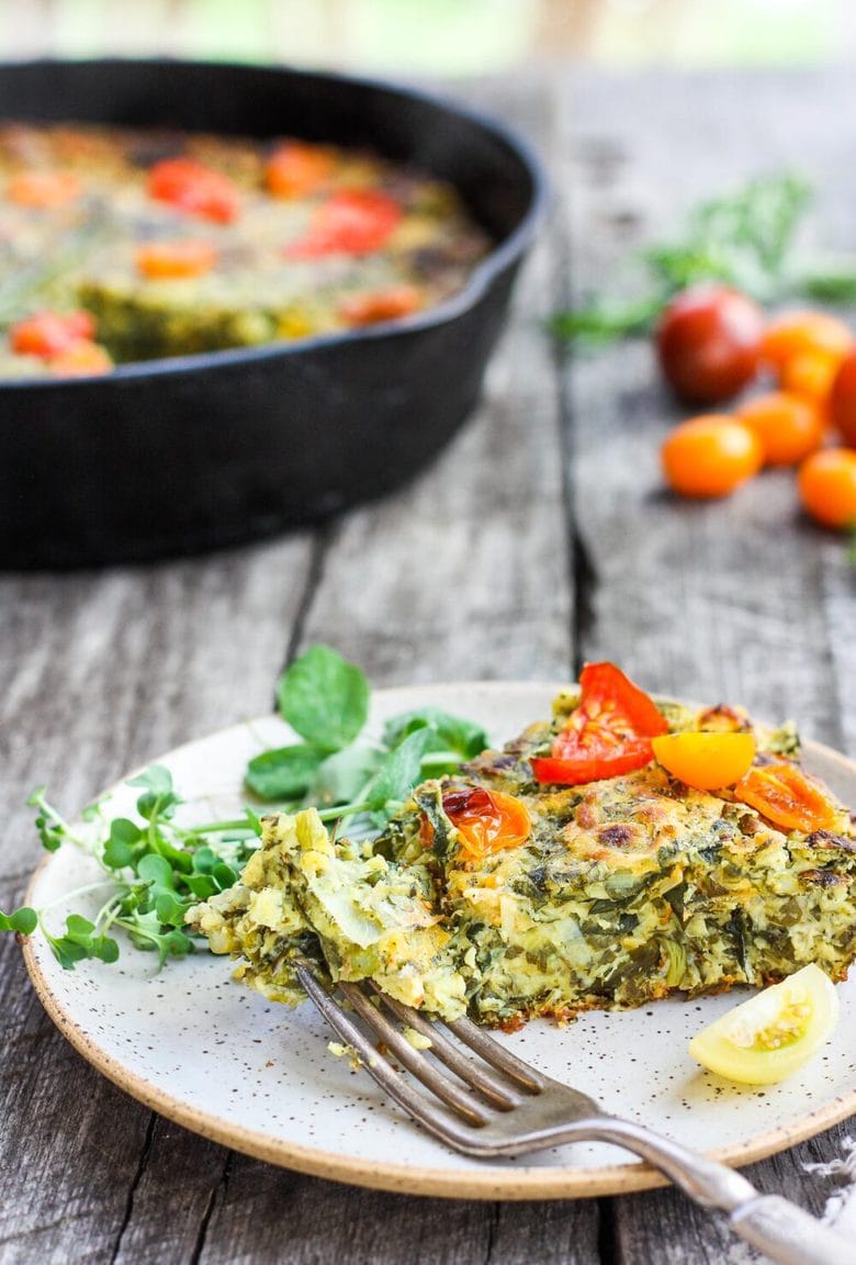 Springy Vegan Frittata stocked up with fresh herbs, leeks and asparagus and a flavorful creamy chickpea flour filling. #frittata #veganbreakfast #veganfrittata