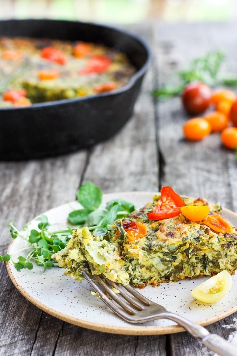 Springy Vegan Frittata stocked up with fresh herbs, leeks and asparagus and a flavorful creamy chickpea flour filling. #frittata #veganbreakfast #veganfrittata