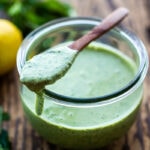 Green Tahini Sauce made with tahini paste, fresh herbs, garlic, lemon and a few slices of green chilies. Perfect with falafels, shawarma, mezze platters!