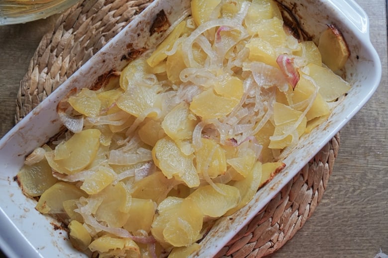 par cook the potatoes and onions in an oven to soften.