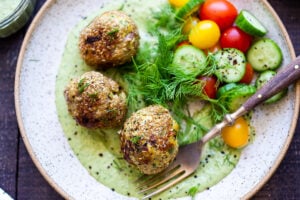 Zaatar Meatballs with Green Tahini Sauce can be made with ground turkey, chicken, lamb or beef. A quick, low carb meal that is full of flavor. #meatballs #zaatar