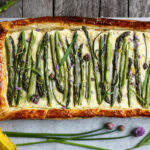 Asparagus Tart with tarragon, chives and gruyere in a flakey puff pastry crust- a simple elegant dish, perfect for a special occasion. Under 30 minutes of hands-on time! #asparagustart