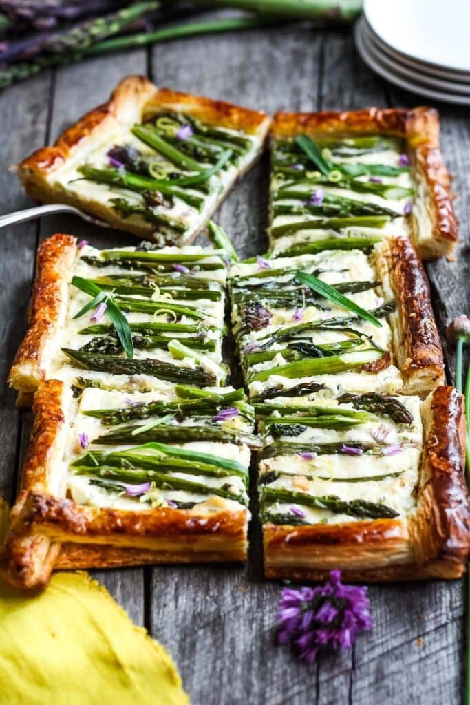 Asparagus Tart with tarragon, chives and gruyere in a flakey puff pastry crust- a simple elegant dish, perfect for a special occasion.  Under 30 minutes of hands-on time! #asparagustart