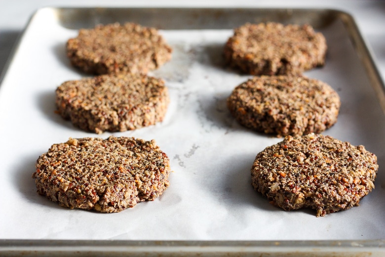 Formed veggie burger patties on a sheet pan.