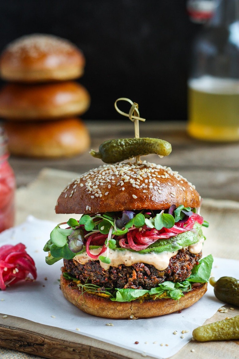 Packed with nutritious ingredients, this Chickpea Quinoa Veggie Burger is full of savory delicious flavor and satisfying texture.  Great with a variety of toppings. Vegetarian and Gluten-free, Vegan-adaptable! #veggieburger #chickpeaburger 