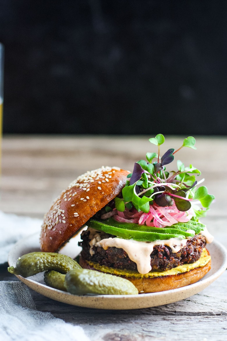 Packed with nutritious ingredients, this Chickpea Quinoa Veggie Burger is full of savory delicious flavor and satisfying texture.  Great with a variety of toppings. Vegetarian and Gluten-free, Vegan-adaptable! #veggieburger #chickpeaburger 