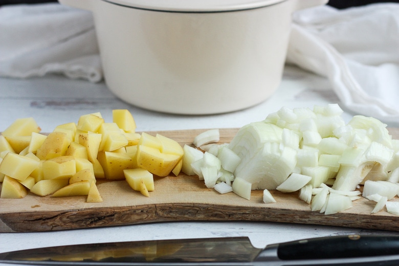 chopping potatoes and onion