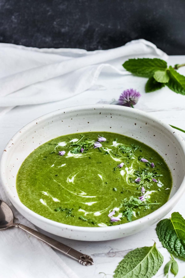 Creamy Vegan Spinach Soup, velvety smooth with a refreshing hint of mint.  Simple clean ingredients create a deeply nourishing and delicious soup that is dairy-free.  Vegan and Gluten-free. Serve warm or chilled. #spinachsoup 