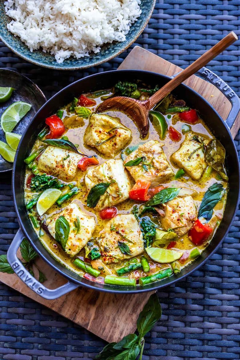 This recipe for Thai Fish Curry with Coconut Milk is brimming with seasonal veggies and bursting with delicious Thai flavors. A quick and easy dinner, perfect for both weeknights and special occasions.  #thaifishcurry 