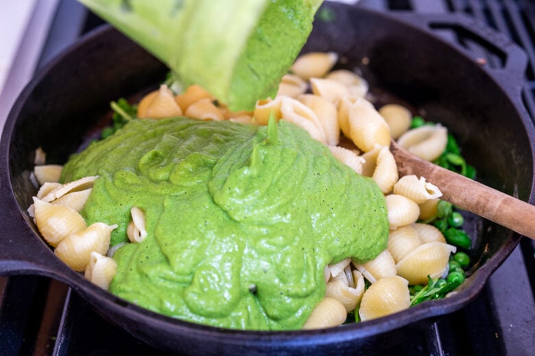Then combine the pasta and sauce, mixing all together for creamy pea pasta.