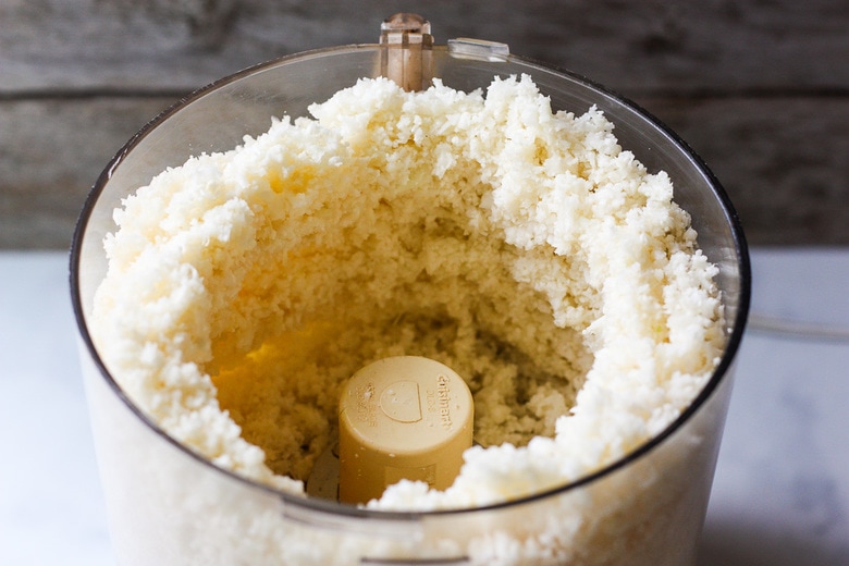 cauliflower pulsed in food processor until a coarse snowy texture forms.